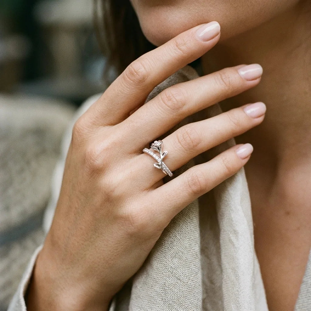 Silver adjustable ring from Gemz By Purpuls worn on a hand resting on the shoulder