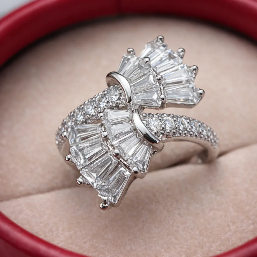 Diamond ring with baguette cut stones on a red cushion