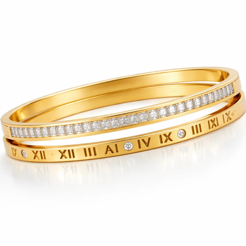 Gold bracelet with Roman numeral and diamond accents on a white background