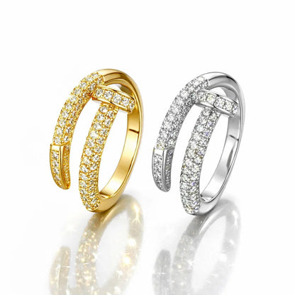 Gold and silver rings with diamond accents on a white background
