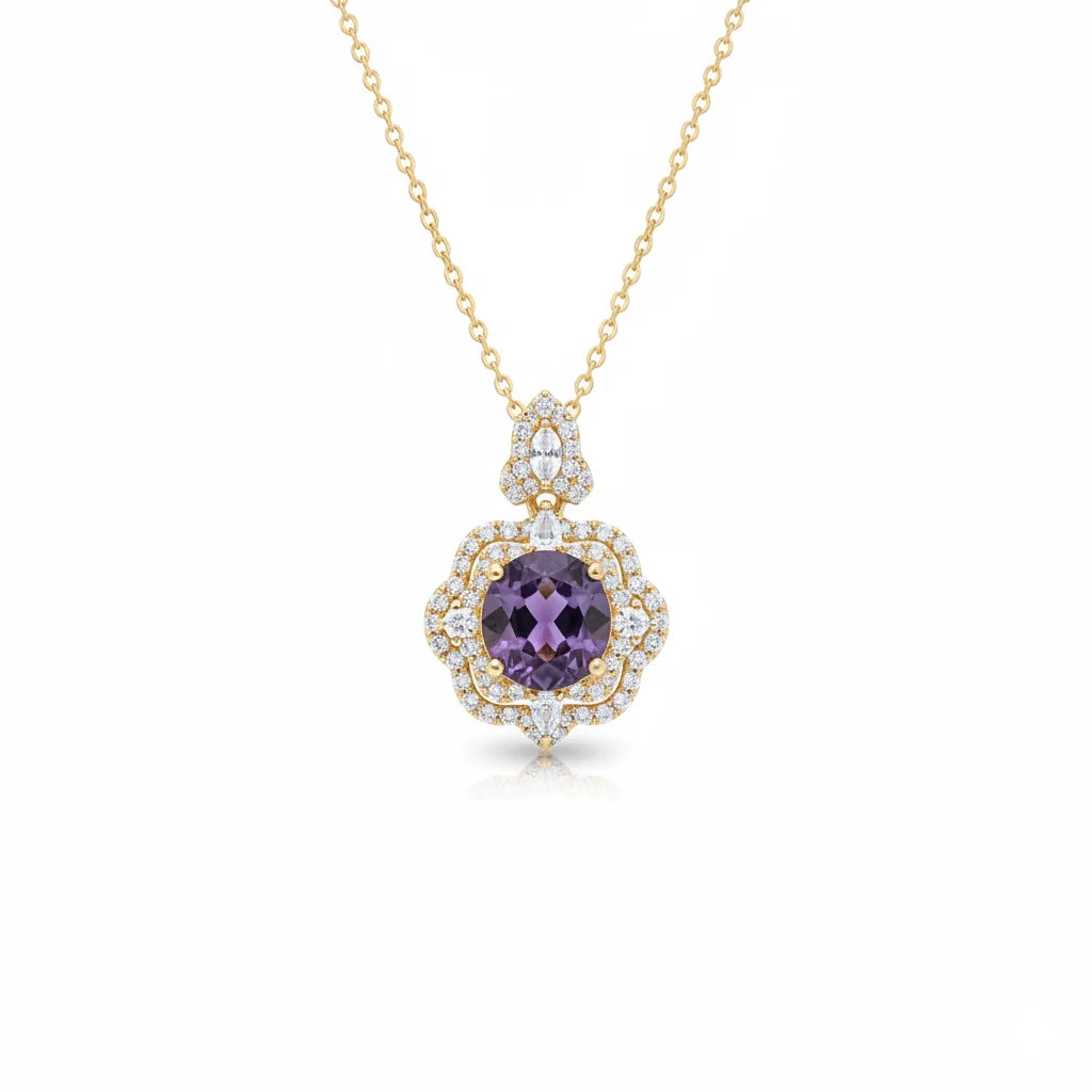 Gold necklace with a purple gemstone pendant on a white background