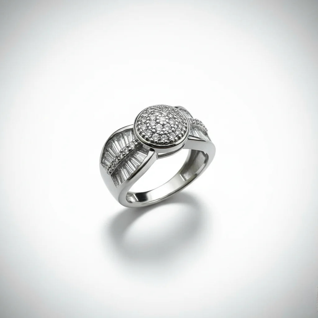 Silver ring with gemstones on a light gray background