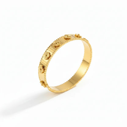 Gold bracelet on a white background