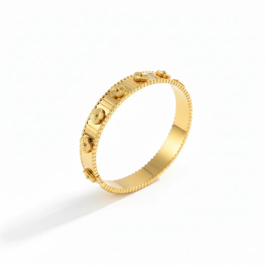 Gold bracelet on a white background