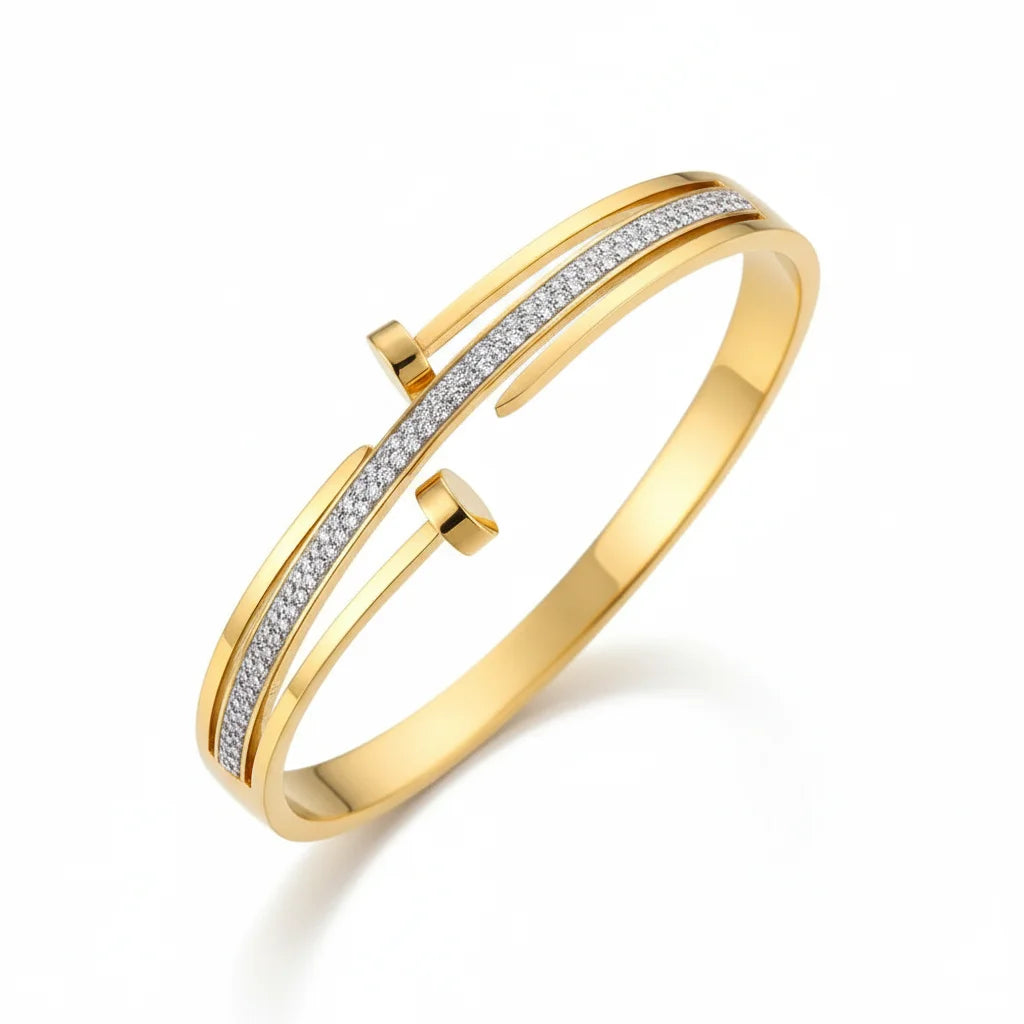 Gold bracelet with diamond accents on a white background