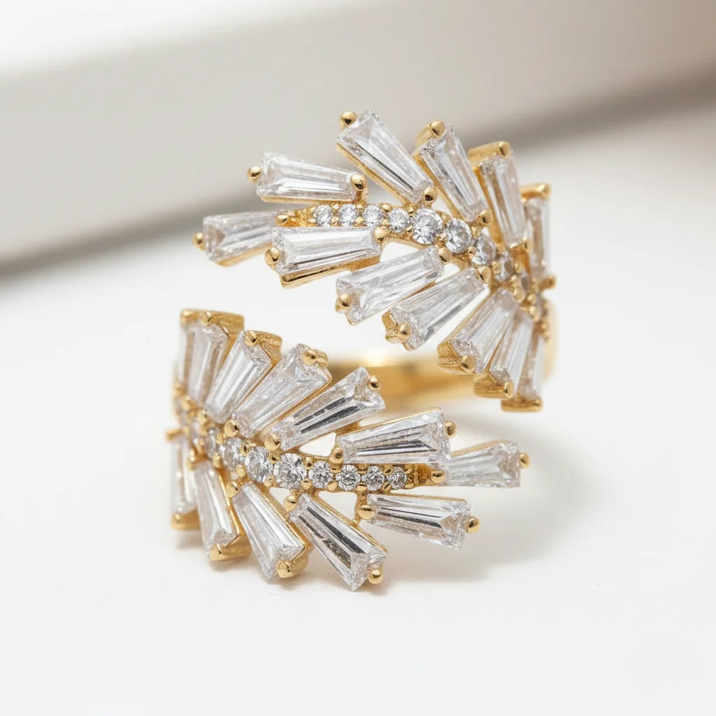 Gold and diamond ring on a white background
