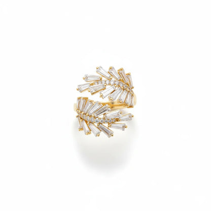 Gold and diamond earring on a white background
