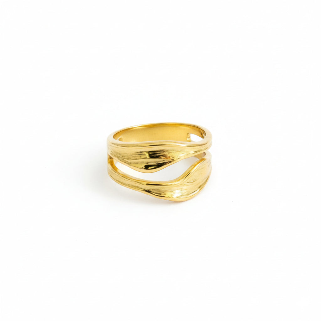 Gold ring on a white background