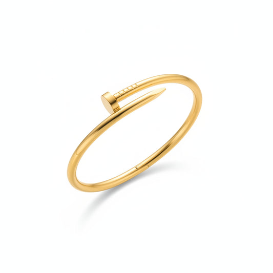 Gold bracelet on a white background