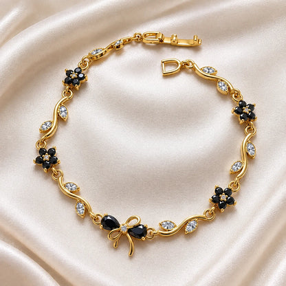 Black zircon bow vine bracelet for women in gold tone with free designer gift box