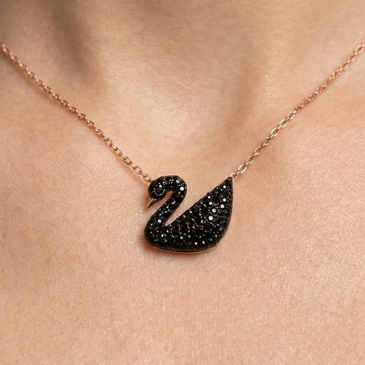 Swan pendant in black closeup
