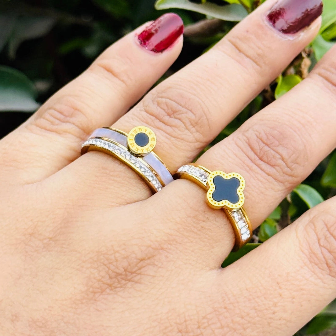 IZAC two gold rings with blue stones worn