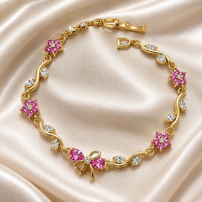 Pink zircon flower vine bracelet with bow charm in gold tone, gift for her