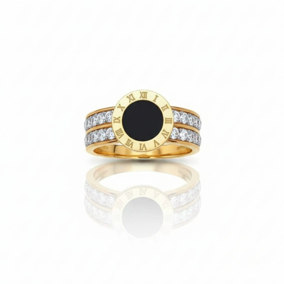Gold ring with a black center and diamond accents on a white background