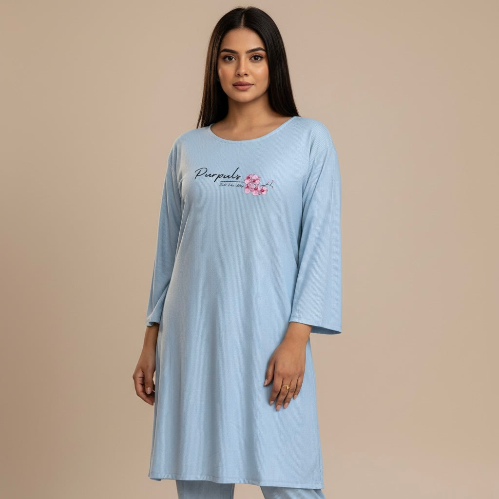 Woman wearing a light blue nightshirt 