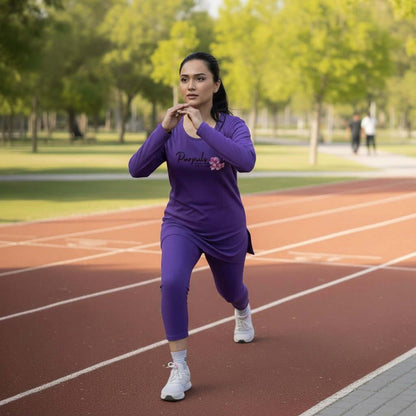 Woman jogging on a red track wearing Purpuls purple tunic and leggings with floral design