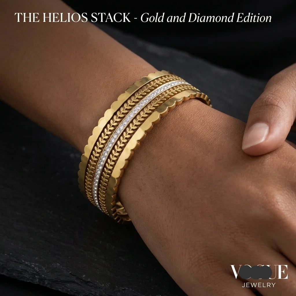 Gold bracelets on a wrist with 'Vogue Jewelry' branding