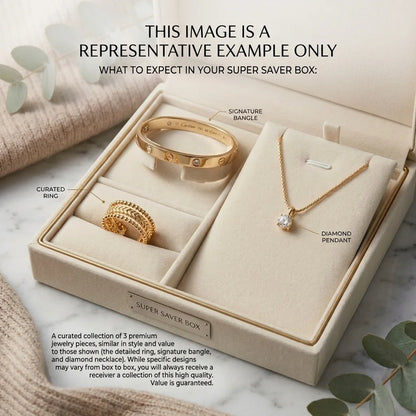 Jewelry set including a gold ring, bracelet, and necklace in an open jewelry box on a marble surface.