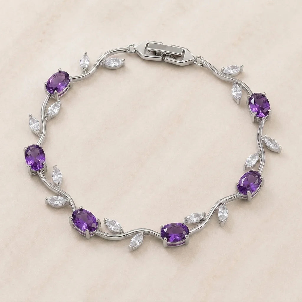 Silver bracelet with purple gemstones on a beige background