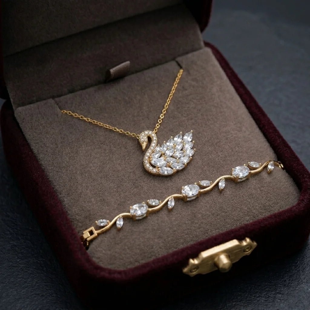 Gold necklace and bracelet set in a jewelry box