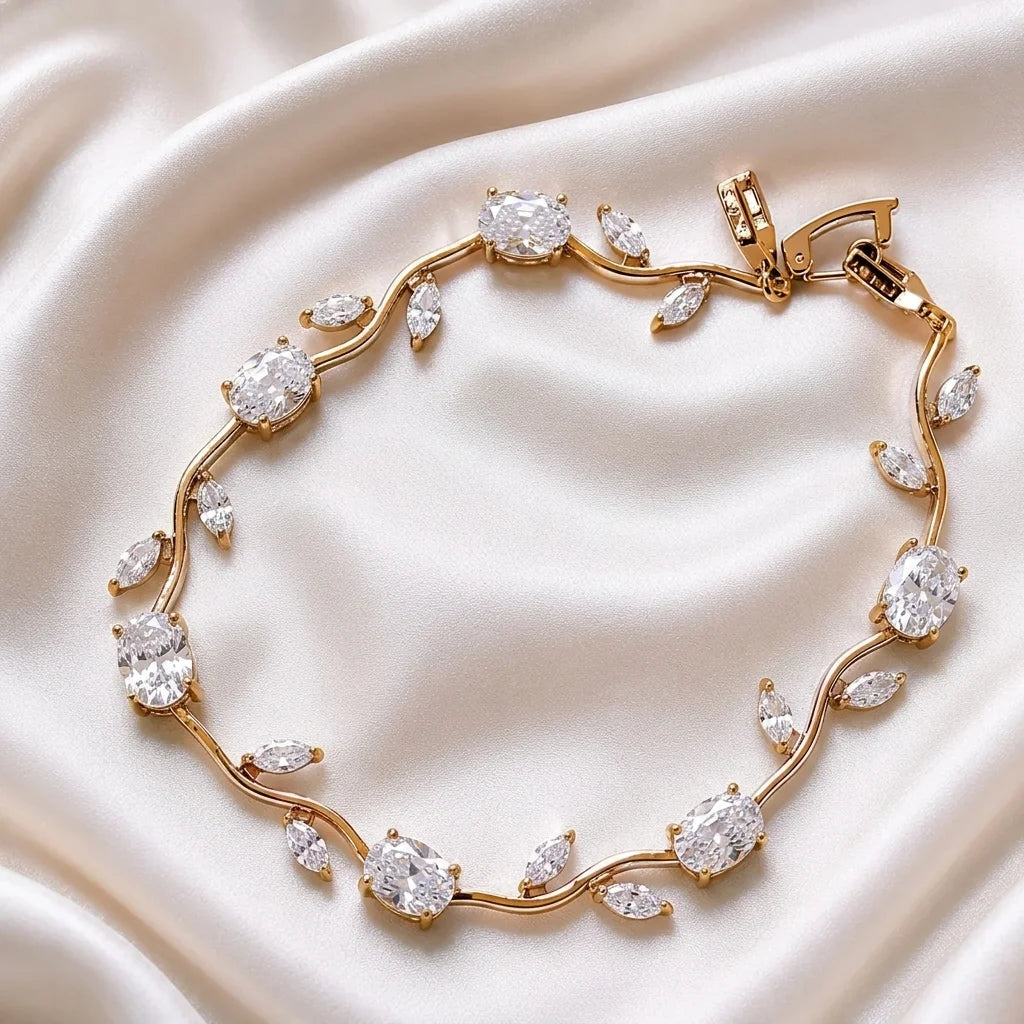 Gold bracelet with diamond stones on a soft fabric background