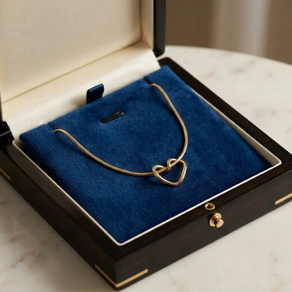 cross heart chain inside box