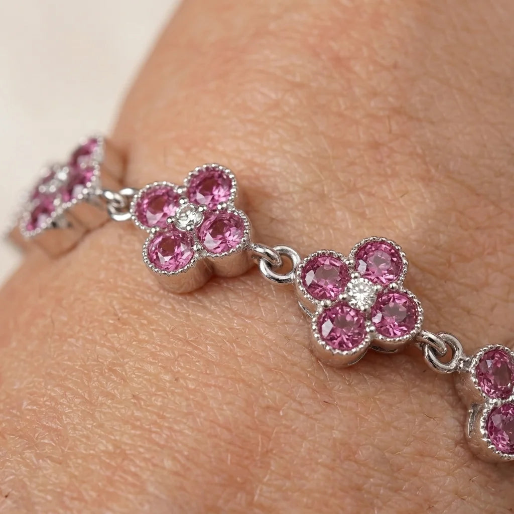Women’s pink flower bracelet with sparkling pink and white stones, elegant silver jewelry
