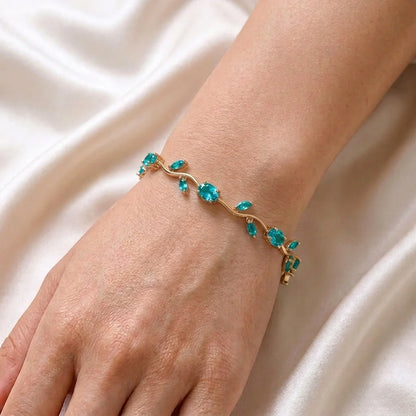 Magazine style aqua bracelet