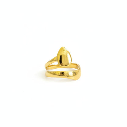 Gold ring with a unique design on a white background