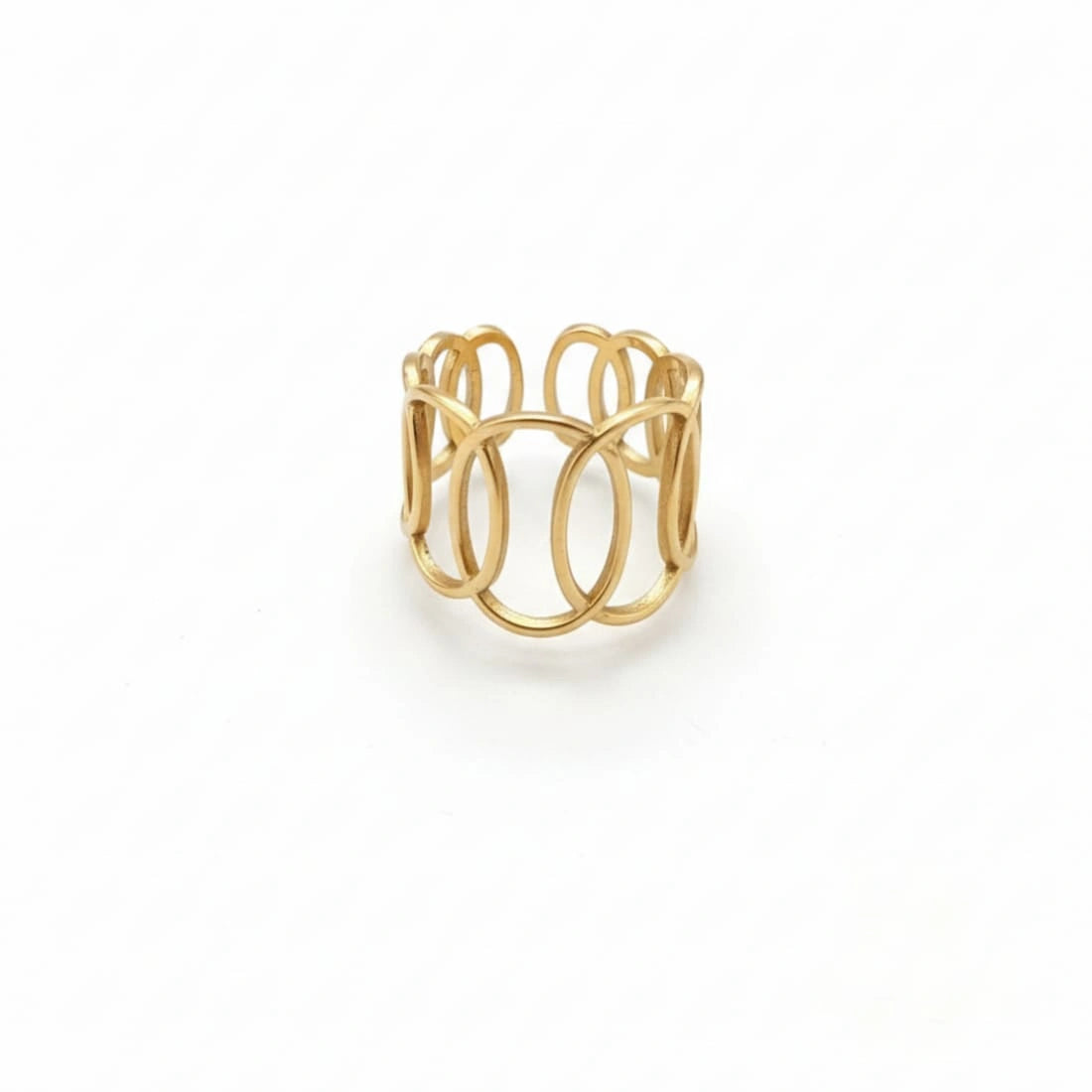 Gold ring with a modern design on a white background